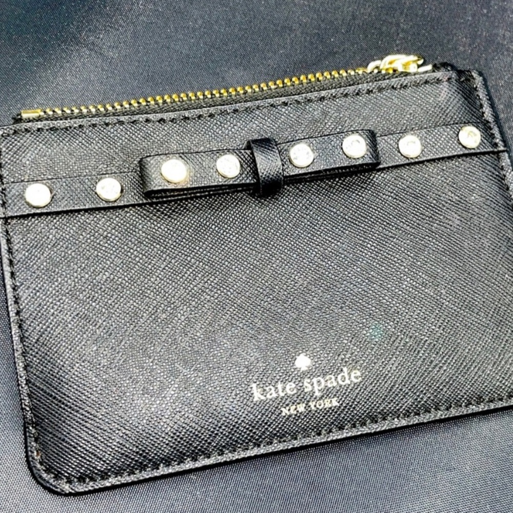 Kate Spade wallet/cardholder   Very feminine rhinestones and bow accent.